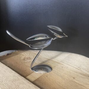Handmade cutlery bird sculpture made from stainless steel cutlery